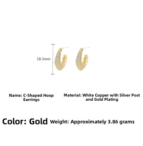 Detail showing dimensions and 18.3mm height of gold plated C-shaped sparkling earrings