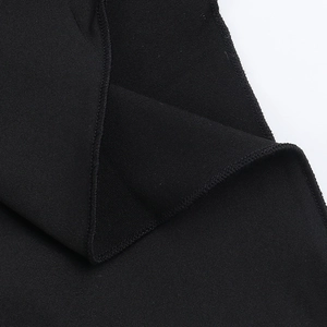 Macro shot of high-elastic black fabric with premium stitching and fine texture details