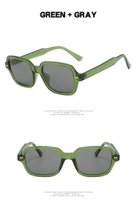 Detailed close-up of green translucent square frame sunglasses with golden metal accents