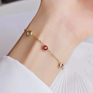 Exquisite 18K gold plated titanium steel bracelet featuring colorful round gemstones
