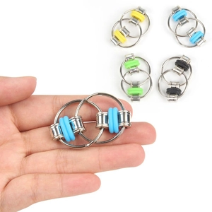 Macro detail of metal fidget chain toy in multiple colors showing tactile rubber O-rings