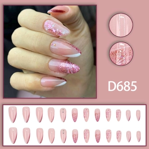 Pink almond press-on nails with french tips, glitter stars and rhinestones set
