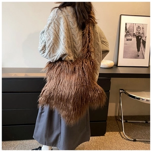 Brown faux fur star-shaped shoulder bag featuring a large fluffy aesthetic design