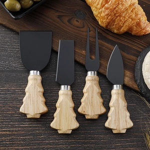 Detail view of 4-piece stainless steel cheese knives with Christmas tree wooden handles