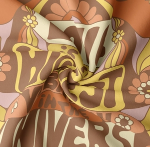 Detailed macro view of retro 70s psychedelic floral knit fabric with artistic texture