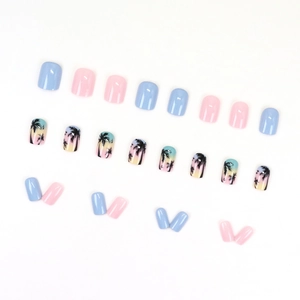 Pastel blue and pink press-on nails with sunset gradient and coconut tree silhouette