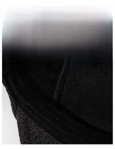Macro detail of the thickened sweatband inside the warm winter beret for men