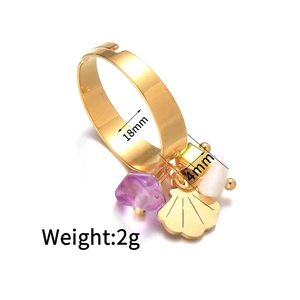 Golden titanium steel ring with purple stone, white bead and shell charms, 18mm diameter