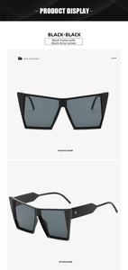 Detailed front and 45-degree side views of black oversized cat-eye sunglasses with silver rivets