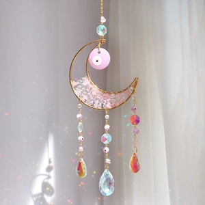 Golden moon crystal suncatcher with pink evil eye and rainbow prisms for window decor
