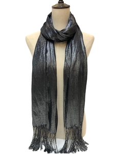 Close-up of dark grey scarf featuring shimmering metallic threads and delicate fringe detail