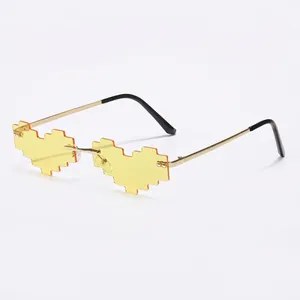 Retro pixel-style heart-shaped sunglasses with yellow lenses and gold metal frames