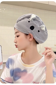 Detailed view of the absorbent thick coral fleece material on the grey koala hair towel