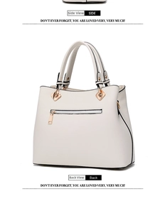 Detailed side and back view of a white tote bag with gold zippers and leather texture