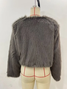 Rear view of a short grey faux fur jacket displayed on a professional garment mannequin