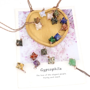 Handmade merkaba star pendant with natural gemstones and copper wire wrapping