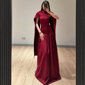 Elegant wine red off-shoulder evening gown featuring a matching shawl and floor-length fit