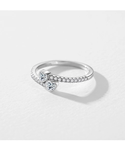 Detailed view of S925 sterling silver ring with heart stones and engraved hallmark