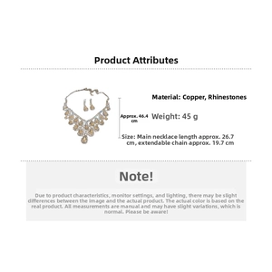 Detailed view of rhinestone water drop tassel necklace and earrings set for evening wear