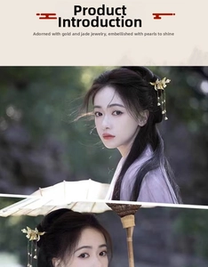 Close-up of elegant gold Chinese hair stick with long tassels on female model in Hanfu