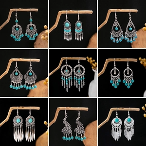 Bohemian retro turquoise earrings collection with vintage silver hollow flower designs
