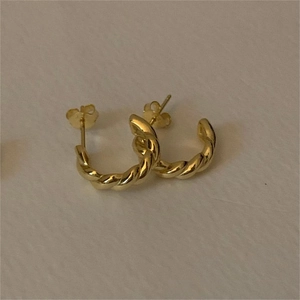 Minimalist 925 sterling silver twisted hoop earrings with a gold-plated finish
