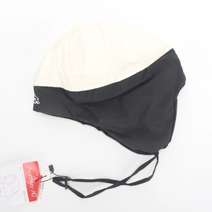 Close-up of windproof earflap hat with warm lining and adjustable strap for winter