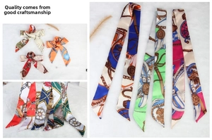 Detailed view of silk-feel skinny scarf featuring equestrian prints and vibrant patterns
