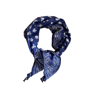 Elegant navy silk scarf necklace featuring white floral and paisley prints for women