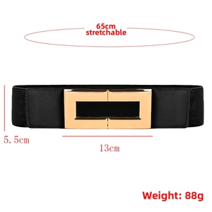 Detail view of elastic waist belt showing 65cm length and gold rectangular buckle