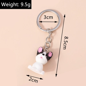 Detailed view of French Bulldog keychain dimensions showing 8.5cm length and 9.5g weight