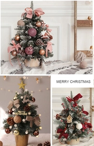 Detailed view of DIY mini Christmas tree with ornaments, pine cones and warm lights