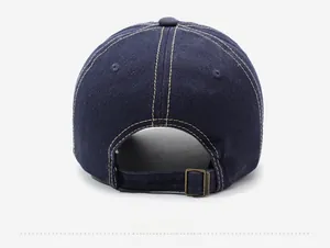 Detail view of the vintage navy denim baseball cap showing the metal buckle and stitching