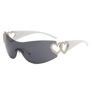 White Y2K wrap around sunglasses with heart metal detail and grey oversized lenses