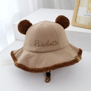Detail of baby panda hat with khaki corduroy, faux fur trim, and adjustable windproof strap