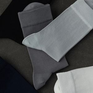 Premium men's silk and cotton dress socks in five classic colors for business and casual wear