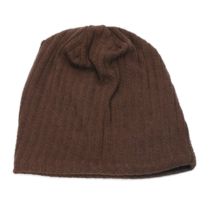 Detail of dark brown ribbed knit beanie showing soft texture and vertical stripe pattern