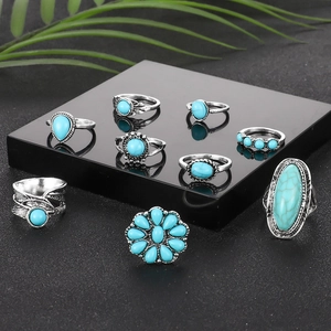 Vintage 9-piece bohemian silver-plated ring set with turquoise stone and feather motifs