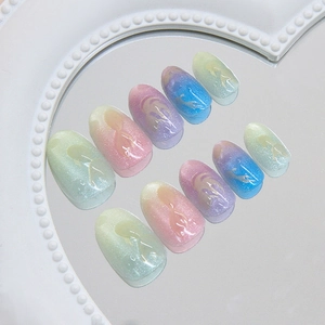 Handmade gradient cat eye press on nails with 3D flame texture in dreamlike colors