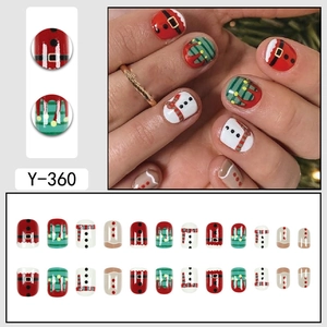 Short square Christmas press-on nails featuring cute Santa, snowman and gingerbread man designs