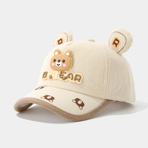 Detail of baby corduroy baseball cap with 3D bear ears and cartoon bear patch