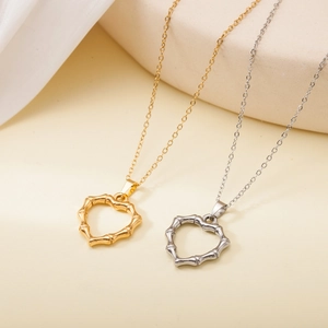 Minimalist gold and silver bamboo texture heart pendant necklaces in stainless steel