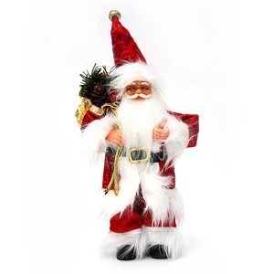 Standing Santa Claus figurine in red suit with gift sack for Christmas decoration