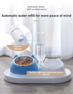 Detail of automatic water refill system and stainless steel bowl for pets