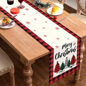 Christmas table runner with red plaid edges, snowflakes and festive trees decoration