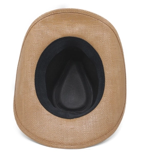 Detail view of the brown cowboy straw hat showing the inner sweatband and weave texture