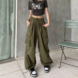 Olive green American retro cargo pants with wide leg straight fit and utility pockets