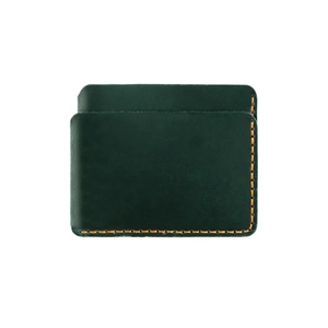 Detail of vintage green cowhide leather wallet with contrasting orange hand-stitched seams