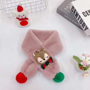 Detail of pink plush kids scarf with reindeer motif and red and green pompoms