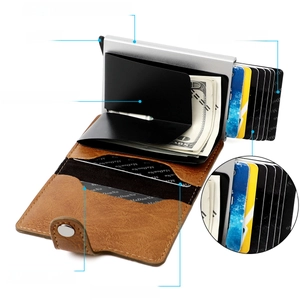 Detailed interior of RFID blocking wallet with pop-up card slot and brown leather pockets